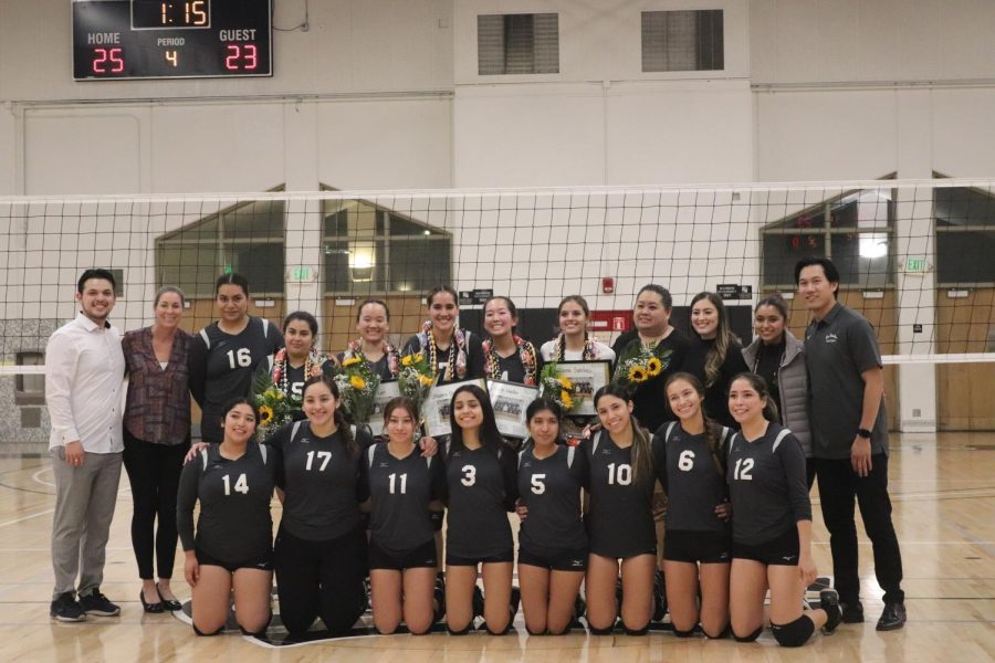 Rio Hondos Womens Volleyball team poses for a team picture after their victory win of 3-1. This marks their seventh-game winning streak.