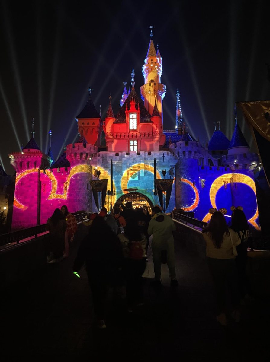 The Sleeping Beauty castle covered with Disney Channel logo projections at Disney Channel Nite at Disneyland on Thursday March 7th, 2024.